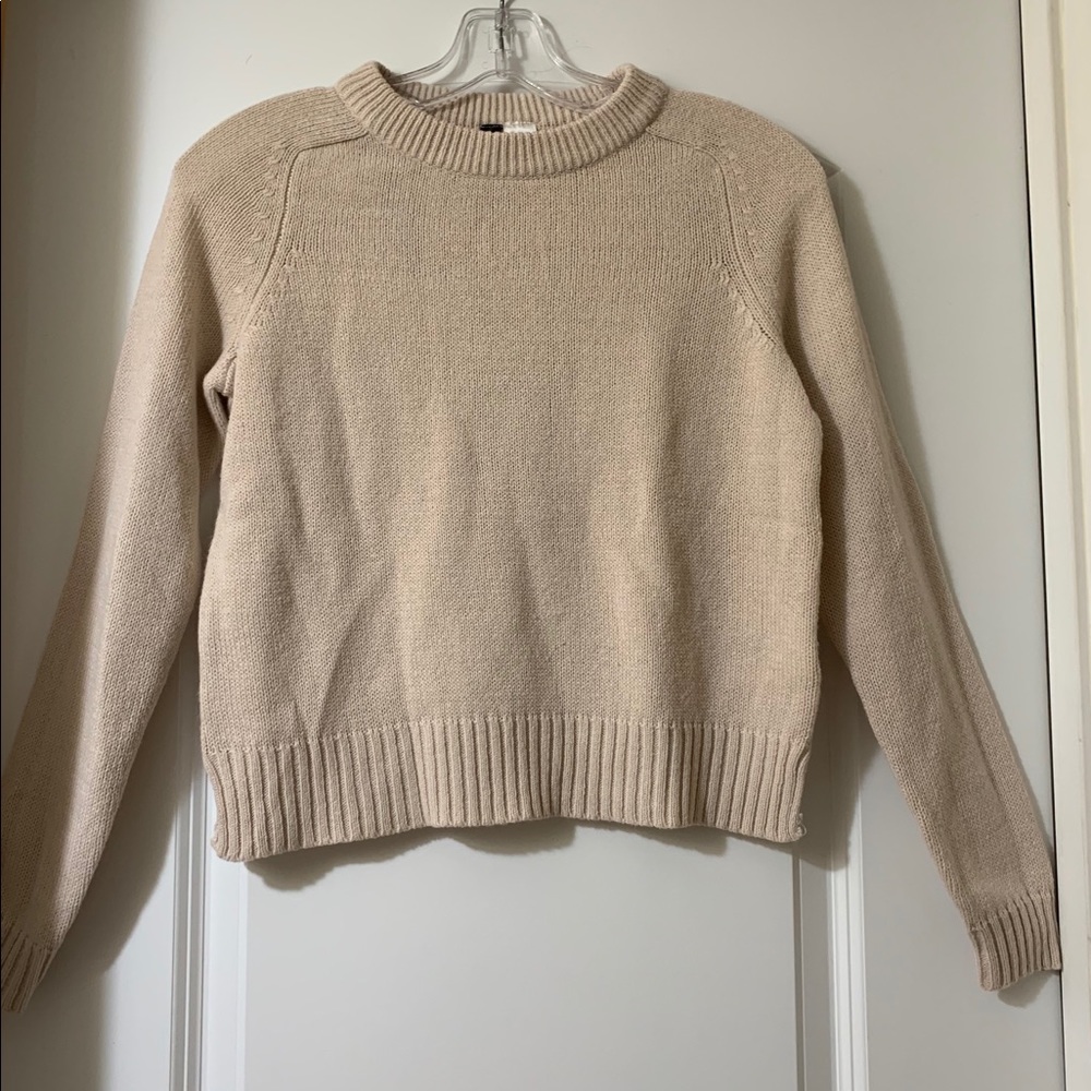 cream-colored sweater